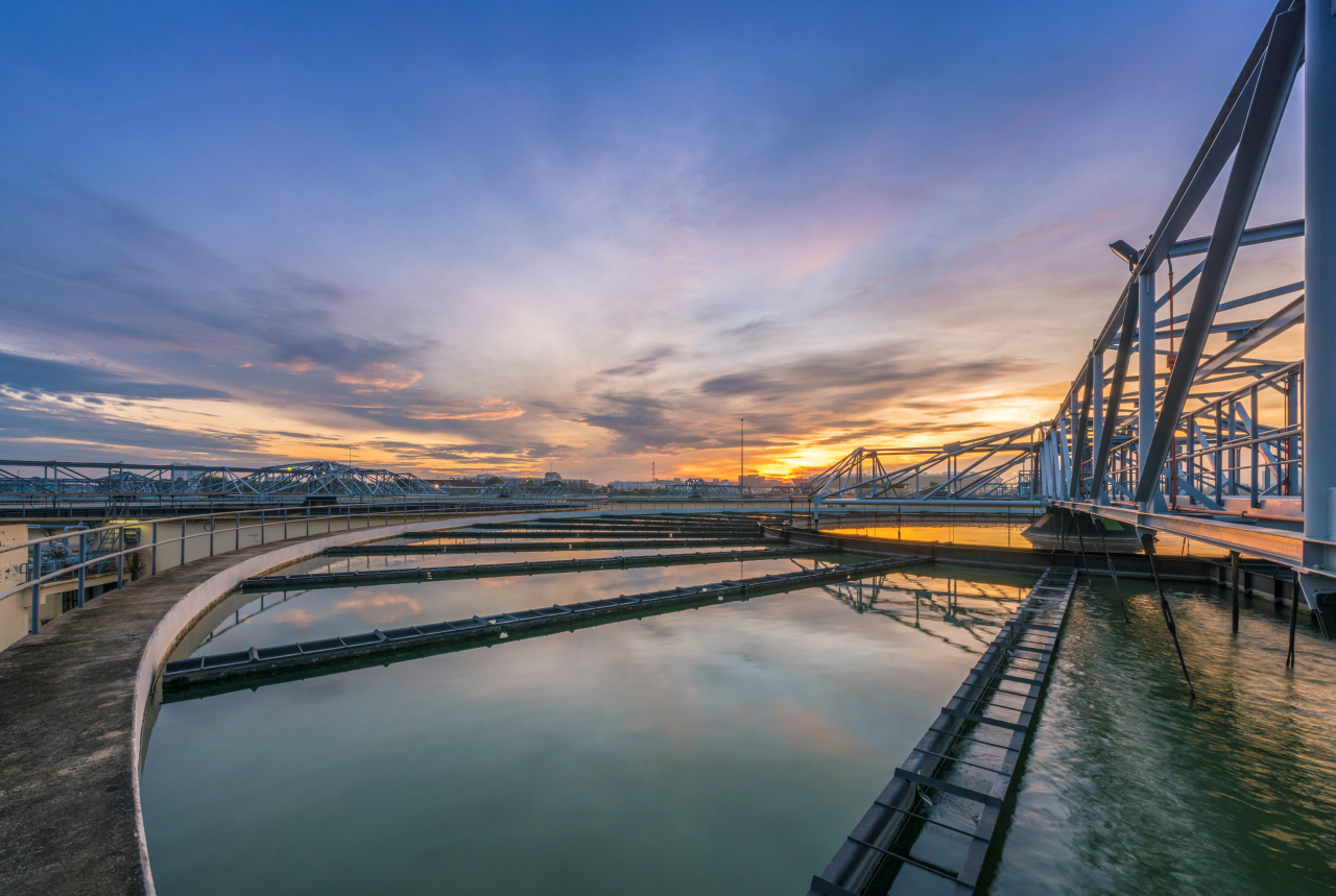 Waste water treatment plant with sunset