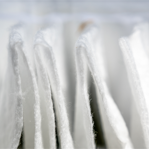 Non-woven silicone finishes showing a white cloth
